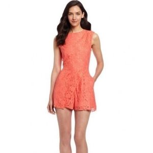 Dolce Vita Raised Lace Romper in Coral